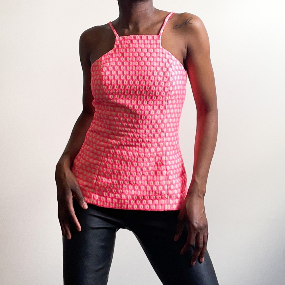 Lilly Pulitzer hot pint top with yellow inside lining.
